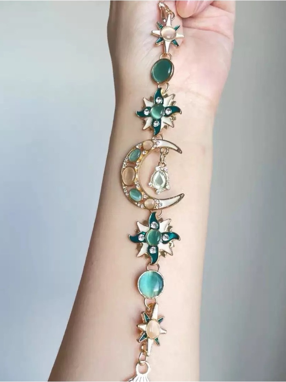 Anthropologie Green and Cream Celestial Charm Bracelet